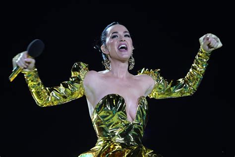 Katy Perry goes topless in ripped tights at Paris Fashion Week